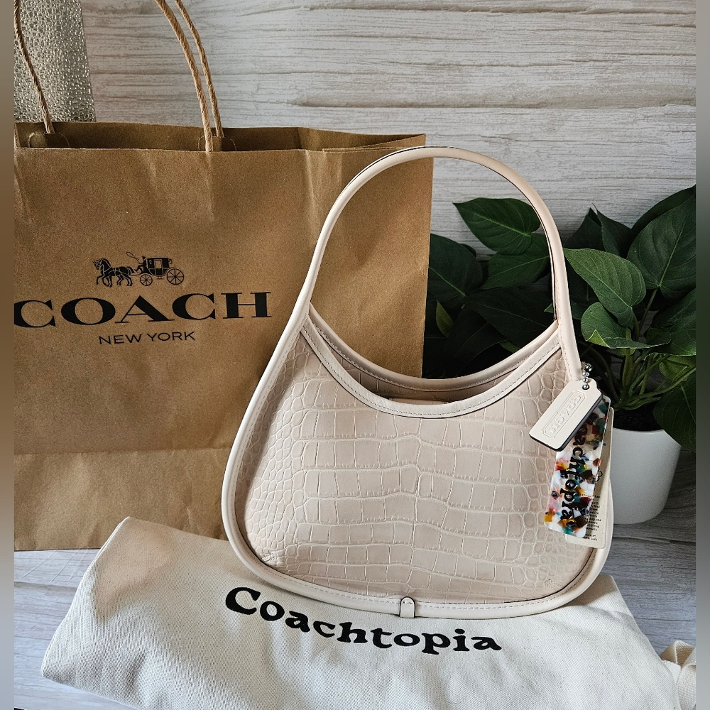 Coach Ergo Bag in Coachtopia cloud beige with dust and shopping bag and tag Leat